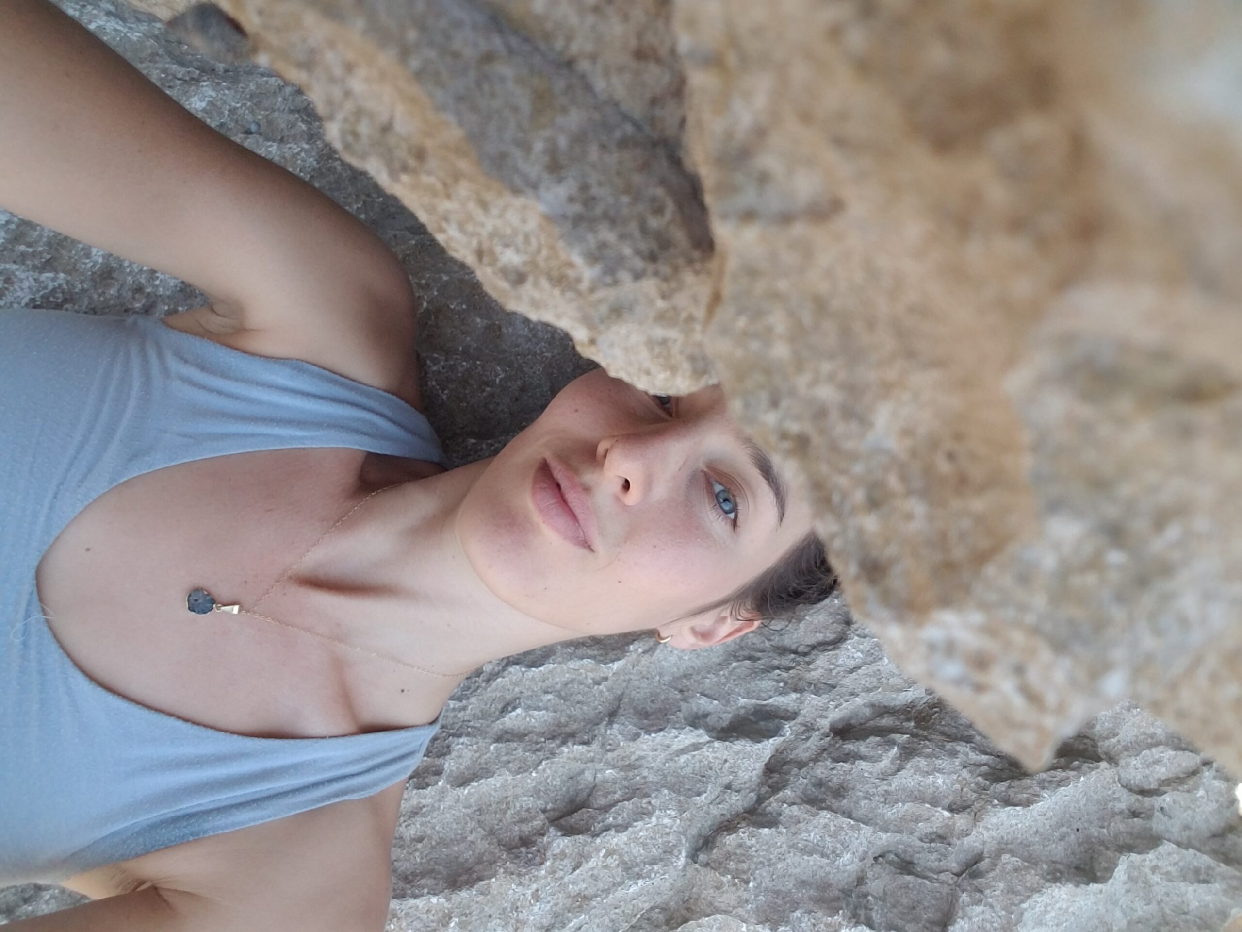 Toby Israel on rocks — personal portrait for Books page